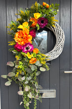 Load image into Gallery viewer, Orange , Cerise and Yellow Cascading Wreatt
