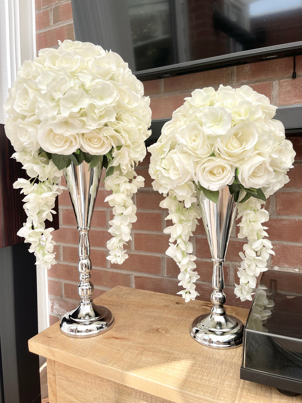 Ivory and White Artificial Flowers and Silver Vase